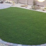 Backyard residence after synthetic grass installation