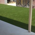 Backyard residence after synthetic grass installation